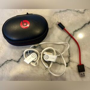 Power Beats wireless earbuds, white, around the ear design